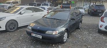 Toyota Carina E: 1998 г., 1.8 л, Механика, Газ, Универсал