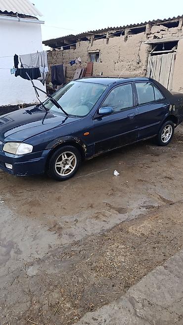 мазда фамили: Mazda Familia: 2000 г., 1.5 л, Механика, Бензин, Седан — 1