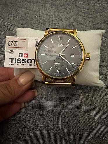 106 saat: Tissot qol saatı. Klassik və zərif dizayna malik model qızılı rəngli — 1