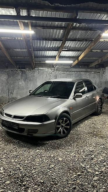 Другие автомобили: Седан серебристого цвета, 4 двери. Компактный и удобный для города — 12