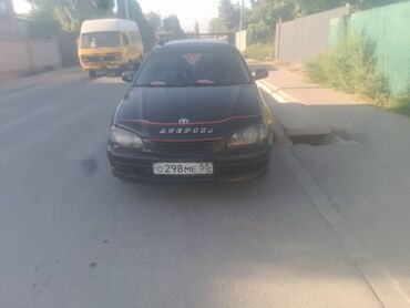 таиота авенсис: Элегантный седан Toyota Avensis черного цвета, модель "лифтбэк"