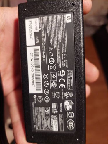 komputer adapter: HP adapter 65W 18.5V 3.5A. Tam orijinaldır. ABŞ-dan alınıb