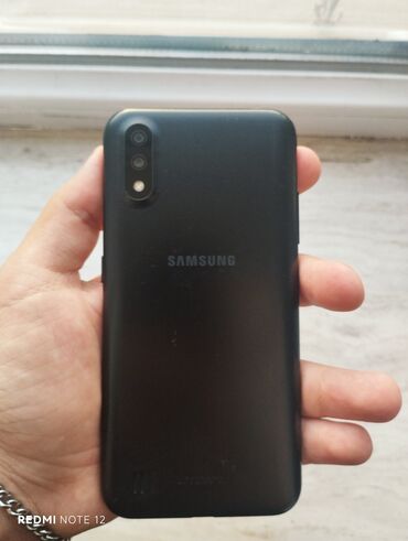 Samsung Galaxy A01, 16 ГБ, цвет - Черный, Две SIM карты, Face ID