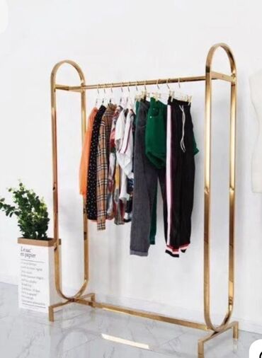 Mağaza asılqanları: Paltar asmaq üçün nəzərdə tutulmuş metal konstruksiyalı asılqan. Bu — 6