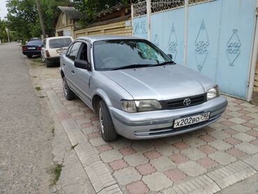 зарядное устройство аккумулятора автомобиля: Toyota Corsa: 1999 г., 1.3 л, Автомат, Бензин, Седан