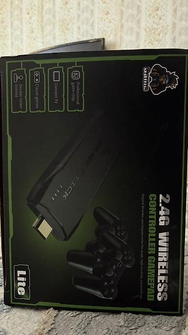 playstation 4 цена в бишкеке: Игровая приставка Game Stick Lite с беспроводными геймпадами — 1