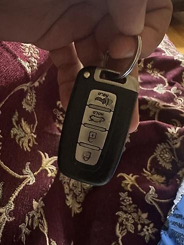 hyundai accent 2005 амортизатор: Avtomobil üçün uzaqdan idarəetmə açarı (fob) - 4 düyməli idarəetmə — 1