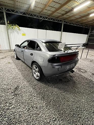 Унаа сатуу: Mazda Lantis: 1996 г., 1.6 л, Кол менен иштөөчү, Бензин, Седан — 1