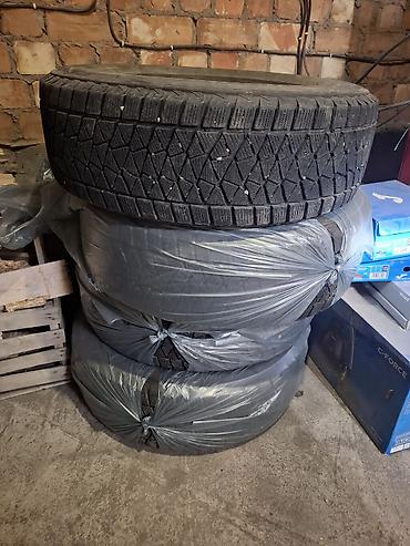 Шины: Bridgestone Blizzak DM-V2, комплект зимних шин без шипов (Studless) — 4
