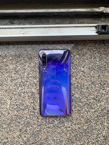 Смартфон Xiaomi Mi 9 SE, фиолетовый (Gradient Violet). продаю срочно