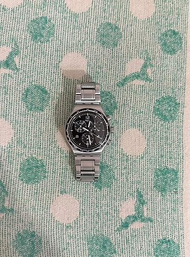 106 saat: Swatch Irony Chrono – paslanmayan poladdan kişi qol saatı Hec bir — 1