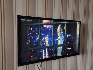 телевизоры led: LG televizor – divardan asma tipli, nazik çərçivəli LED/LCD panel