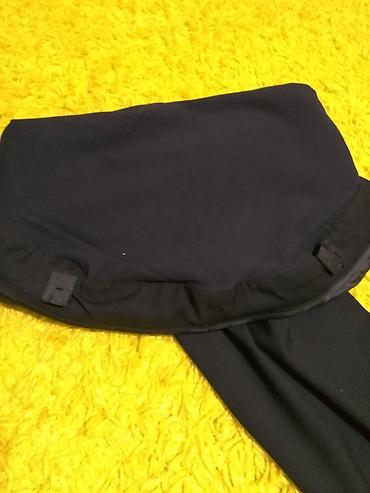 Pantalone: H&M trudnicke pantalone,crna boja.Sasvim nove.Velicina M — 8