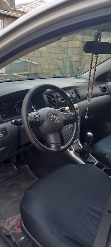 Toyota: Toyota Corolla hatchback (E12) – gümüşü rəng. - Kuzov: 5 qapılı — 7