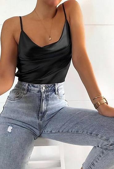 crop kosulja: Satenski krop top sa tankim bretelama
1550 din
S M L — 9
