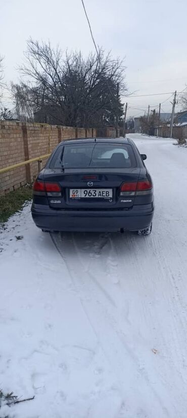 грузовые сапок: Mazda 626: 1997 г., 2 л, Механика, Бензин, Хэтчбэк