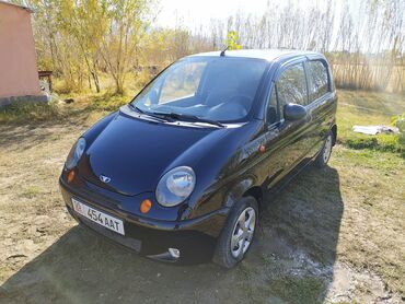 мини электромобиль: Хэтчбек Daewoo Matiz, представленный в черном цвете, является