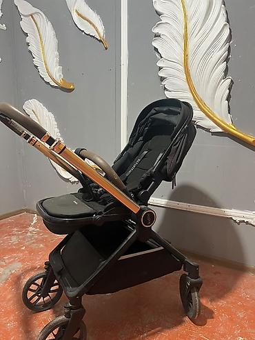 Детский мир: Прогулочная коляска Joie (черная) + детские ходунки Babywalker — 1