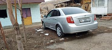 Другие автомобили: Седан серебристого цвета, 4 двери, просторный салон с чехлами на — 13