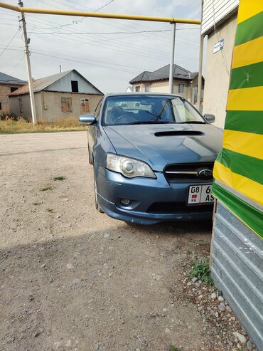 полик на форестер: Автомобиль Subaru Legacy bl5 голубой цвета с кузовом седан.На капоте