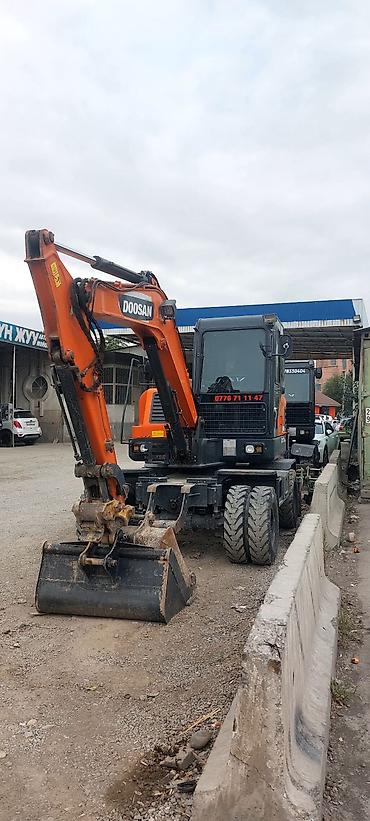 трактор погрущик: Экскаватор, Doosan, 2021 г., Колесный — 1