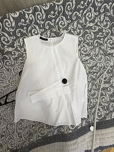 ağ koftalar: Ağ rəngli qadın bluzu – Trendyol etiketi - Model: qolsuz, dairəvi — 1