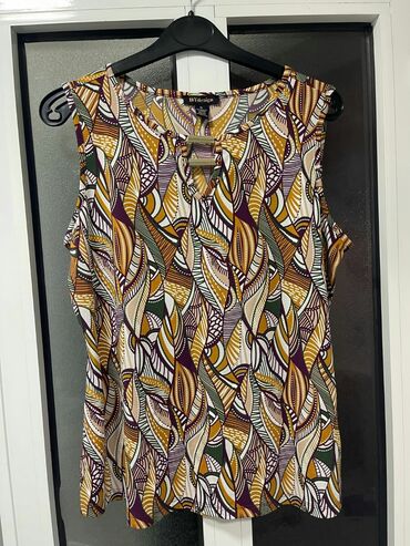 Köynək və bluzalar: Her 1i, 20 ve ya 15 azn cox alana endirim olunacaq, L yaxud xl — 8