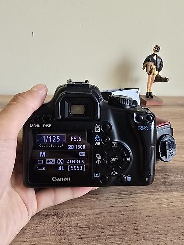 Фотоаппараттар: Зеркальная камера Canon EOS 1000D с комплектом аксессуаров. Основные — 1