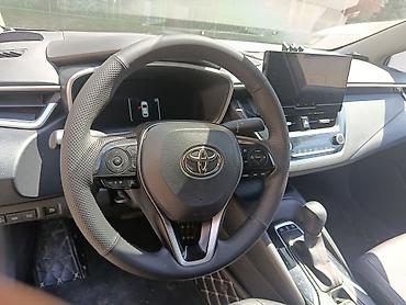 byd e2 2024: Toyota Corolla: 2023 г., 1.8 л, Вариатор, Гибрид, Седан — 6