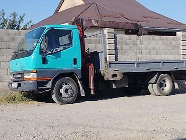 Услуги манипулятора (кран-борт) - Подача бортового грузовика с