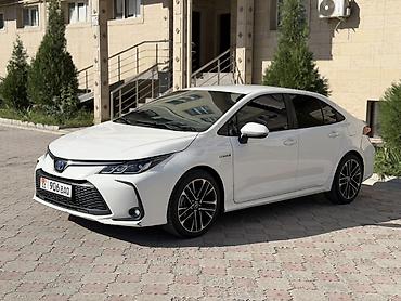 е39 фара: Toyota Corolla: 2023 г., 1.8 л, Автомат, Гибрид, Седан — 2