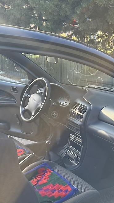 140 280: Mazda 323: 1996 г., 1.4 л, Механика, Бензин, Хэтчбэк — 8