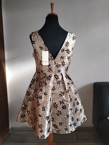 cari: Haljina IVIVI Collection – model 2229 OR, veličina M. - Kroj — 2