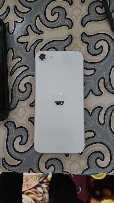 mac mini m4: IPhone se — 1