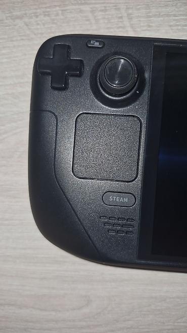 nintendo switch lite сколько стоит: Портативная игровая консоль Valve Steam Deck OLED, 512GB. Практически — 6