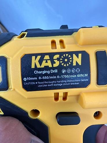 Ударные дрели: Зарядная дрель Kason, представленная в ярком желто-черном корпусе В — 4