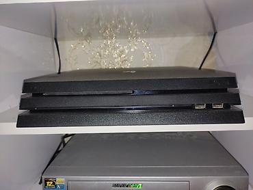 pleystein 4 pro: Sony PlayStation 4 Pro (PS4 Pro) oyun konsolu + 2 ədəd DualShock 4 — 3