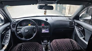 Hyundai: Hyundai Elantra: 2 l | 2005 il Sedan — 16
