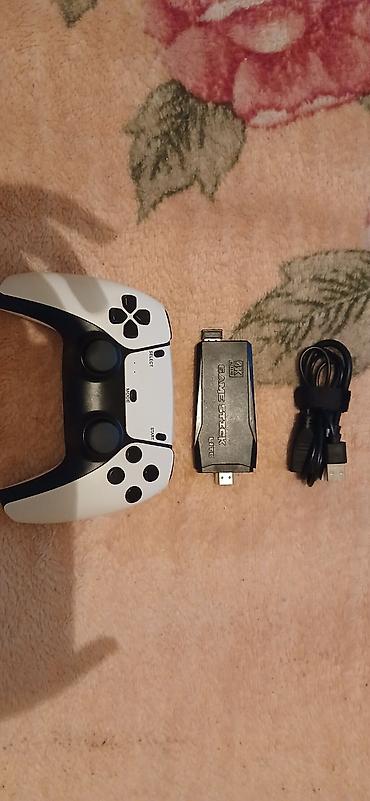 game stick lite 4k: Içində 14 mindən çox oyun var Paketə daxildir: - 1 ədəd simsiz gamepad — 3