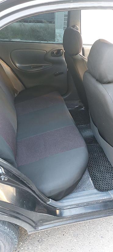 sukanlar: Daewoo Lanos: 1.5 l | 2011 il Sedan — 5