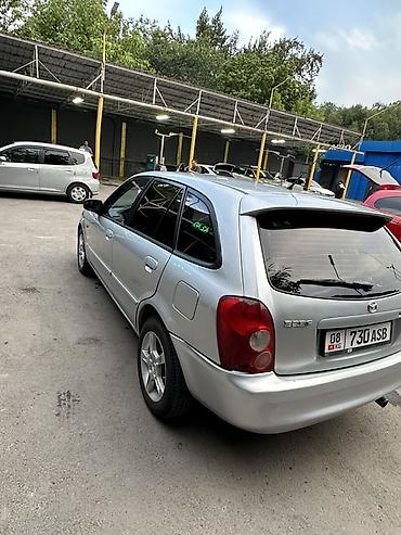 Mazda: Mazda 323: 2004 г., Хэтчбэк — 9