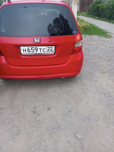 хонда фит багажника: Красный хэтчбек Honda Fit с черными литыми дисками и тонированными