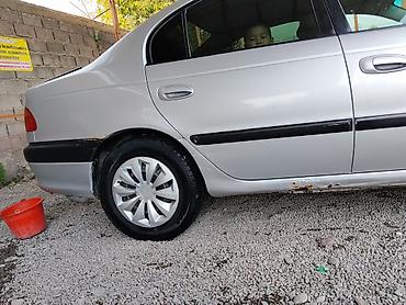 Унаа сатуу: Toyota Carina E: 1999 г., 1.8 л, Кол менен иштөөчү, Бензин, Седан — 9