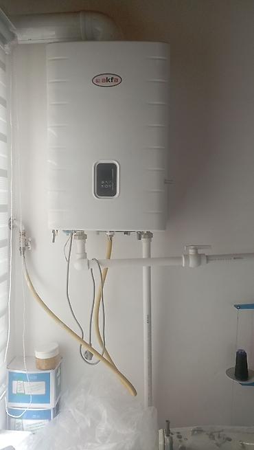 Установка Газовый настенный котёл/колонка