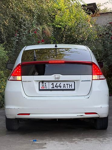 преви: Honda Insight: 2012 г., 1.3 л, Вариатор, Электромобиль — 4