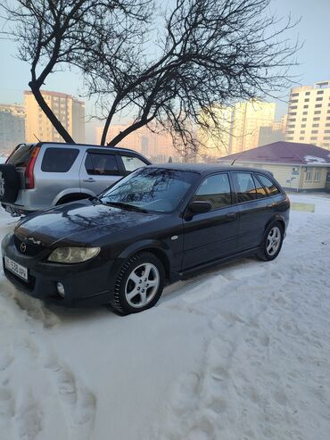 Mazda: Mazda 323: 2001 г., 2 л, Механика, Бензин, Седан