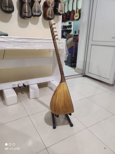 ikinci el saz: Milli saz boyuk