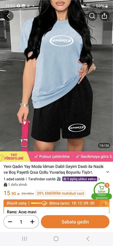 Çadırlar: Açıq mavi qısaqol tişört və qara qısa şortdan ibarət qadın idman