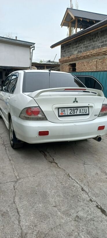 Mitsubishi: Mitsubishi Lancer: 2005 г., 2 л, Механика, Бензин, Седан