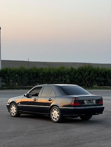 cls 63 amg: Mercedes-Benz C-Class: 2.4 l | 1998 il Sedan — 6
